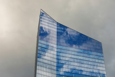 skyscraper against a grey sky, Cloud & Infrastructure | DXC Technology Insights